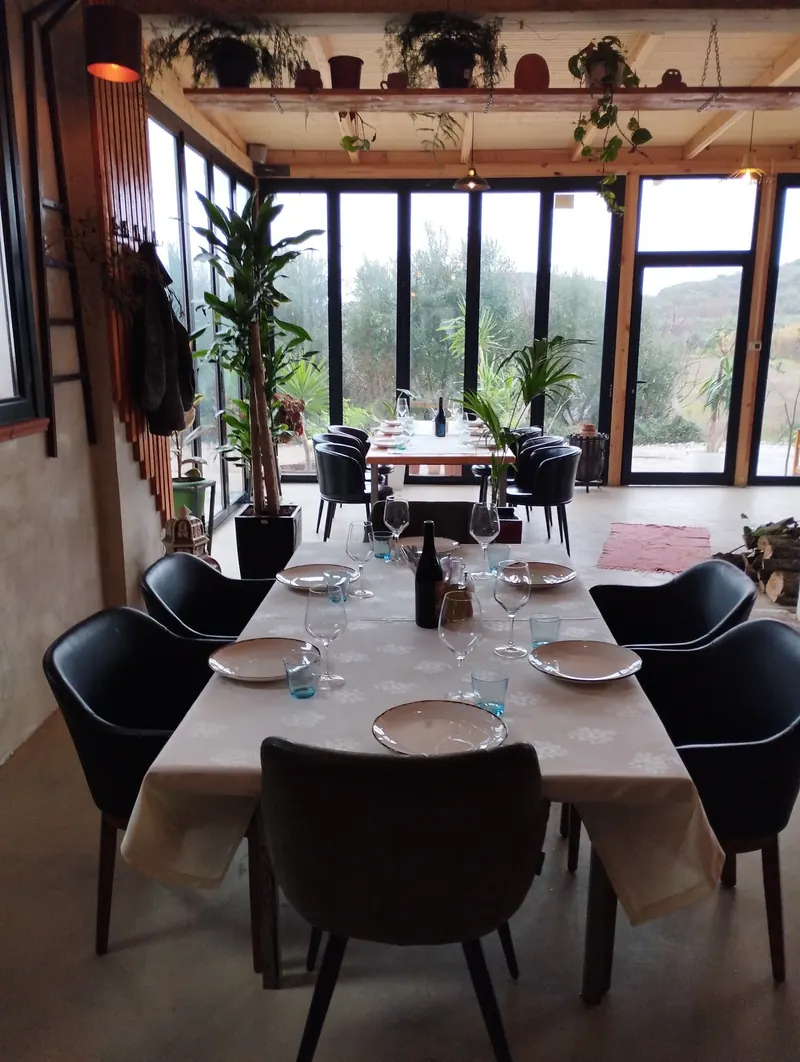 Long table in the glass-walled dining room